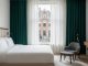 Welke raamdecoratie past het best bij een hotel chique interieur?